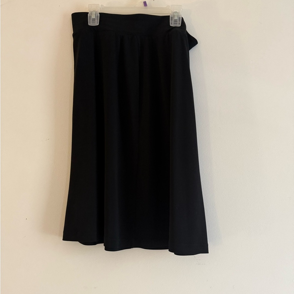 Black pencil skirt fits like Medium
